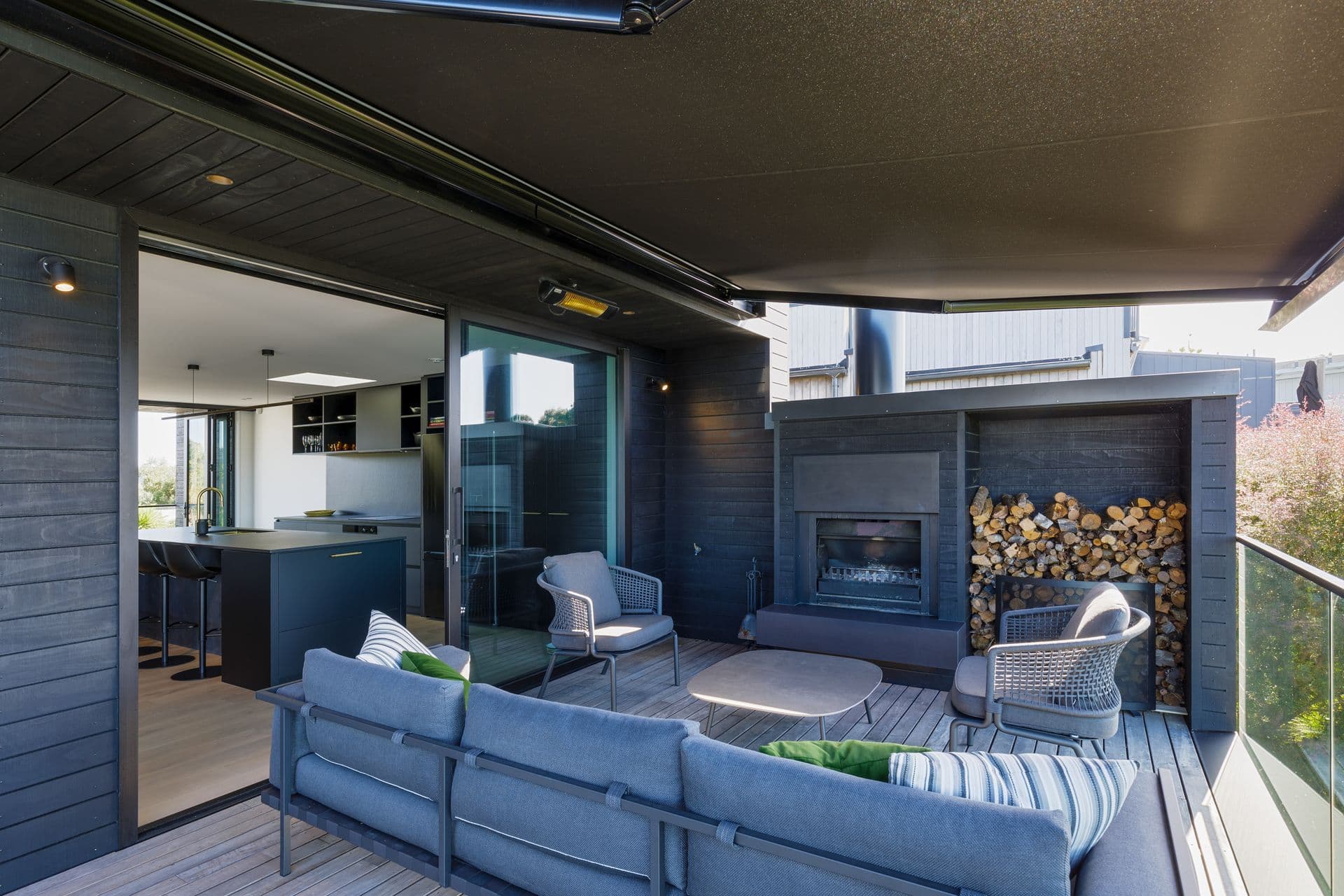 The covered terrace and outdoor fireplace