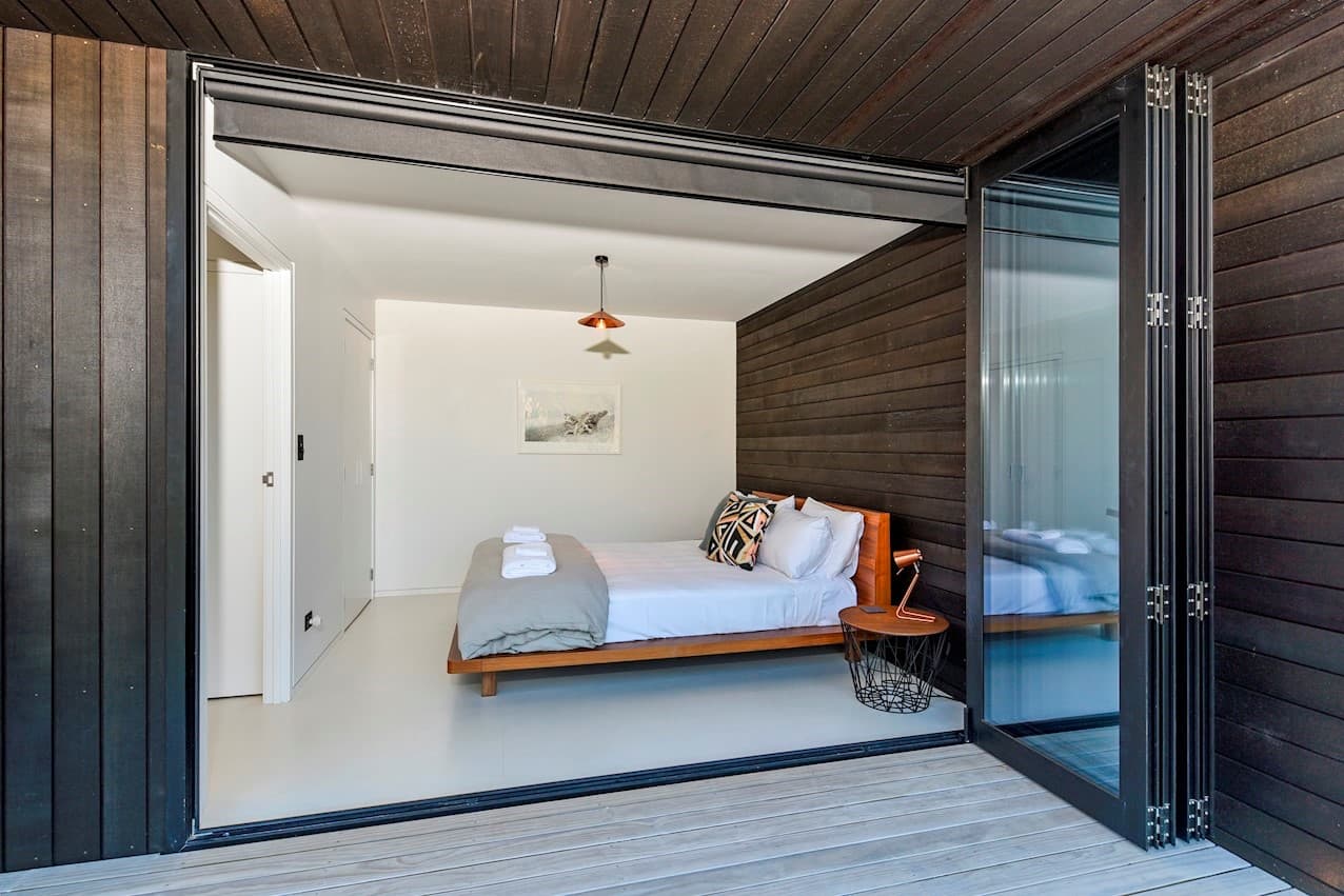 Bedroom opening to the deck
