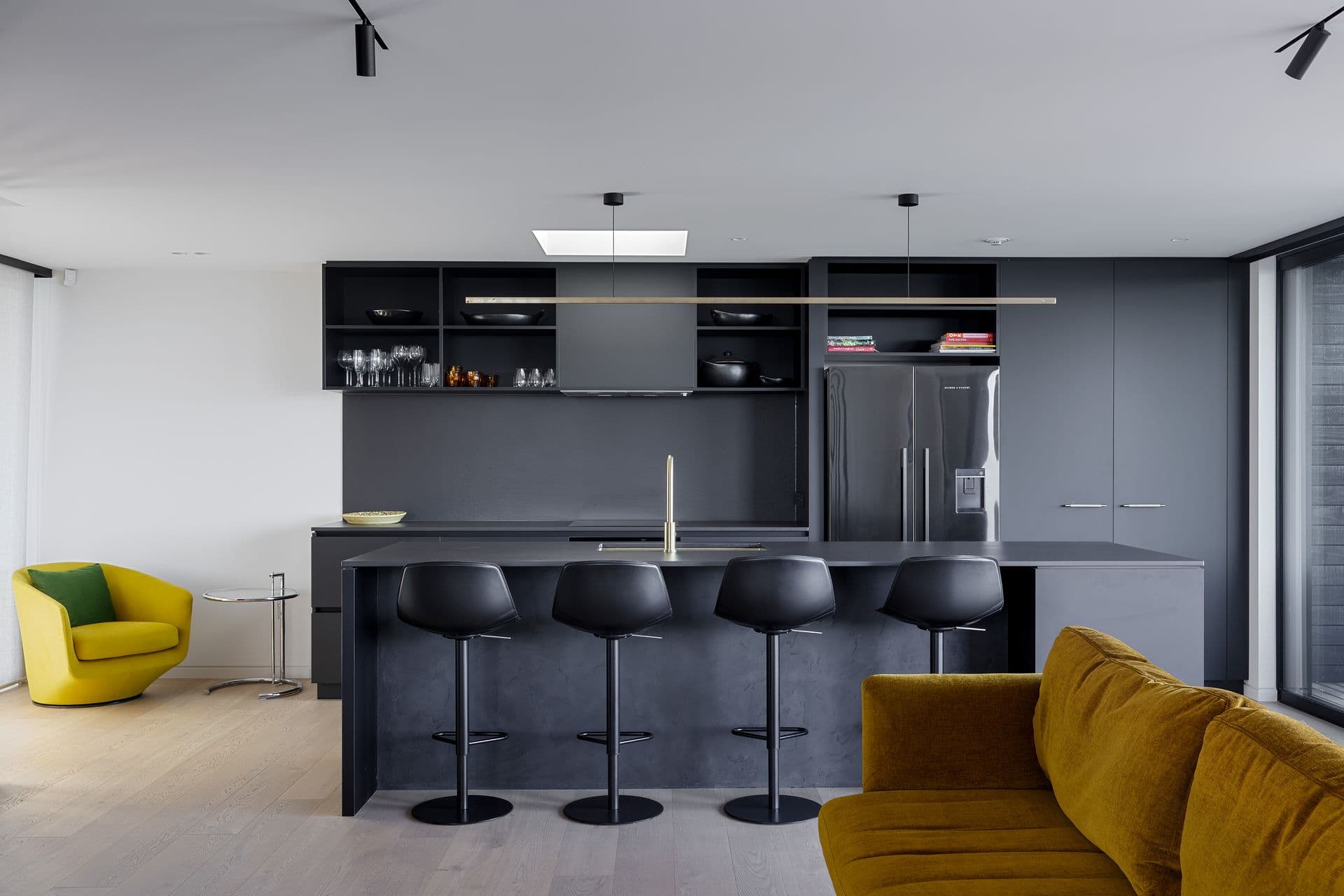 The kitchen and bar seating